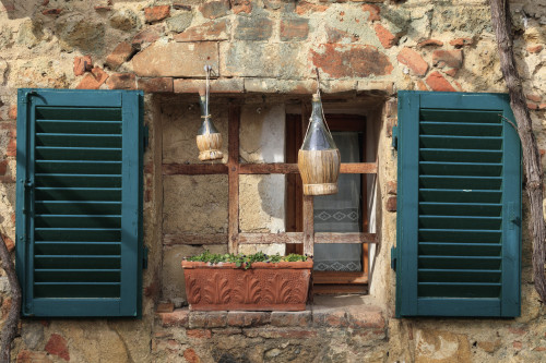 Italy, Monteriggioni. Stone wall, curtained window with blue shutters. Poster Print by Emily Wilson - Item # VARPDDEU16EWI0306