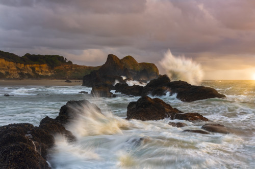 Large waves crashing against the sea stacks along the beach of Seal Rock. Poster Print by Sheila Haddad - Item # VARPDDUS38SHA0007