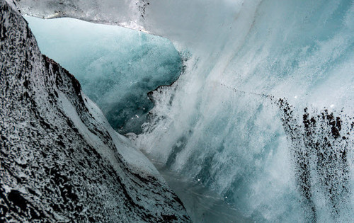 Iceland, abstract ash and blue ice formation on the Solheimajokull Glacier Poster Print by Mark Williford (24 x 18) # EU14MWI0038