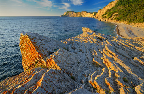 Canada, Quebec, Forillon National Park. Limestone along Atlantic shoreline at sunrise. Poster Print by Jaynes Gallery - Item # VARPDDCN10BJY0149