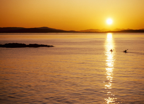Kayakers at sunset, San Juan Island, WA. Haro Strait, Vancouver Island in the background Poster Print by Stuart Westmorland - Item # VARPDDUS48SWR0779