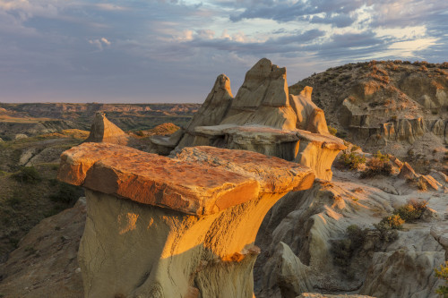 Sculpted badlands formations at first light in Theodore Roosevelt National Park, North Dakota, USA Poster Print by Chuck Haney - Item # VARPDDUS35CHA0418