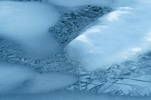 USA, Wyoming, Yellowstone National Park Spring ice forms on lake Credit as: Don Grall / Jaynes Gallery Poster Print by Jaynes Gallery (24 x 18) # US51BJY0289