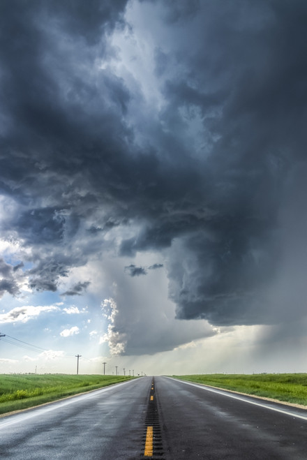 A developing severe thunderstorm with large hail crosses the highway in Colorado, near Burlington; Colorado, United States of America Poster Print by Stuart Short (12 x 19) # 13548906