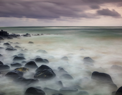 Sunrise over the Pacific Ocean from the shore of Lydgate Beach; Kapaa, Kauai, Hawaii, United States of America Poster Print by The Nature Collection (17 x 13) # 12575767