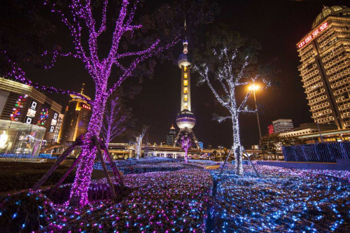 China, Shanghai Artistic light display at night by Jim Zuckerman (24 x 15)