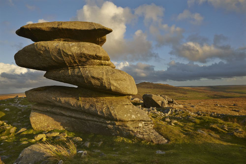 Rocks on Rough Tor bathed in sunset light, on Bodmin Moor, Cornwall, Great Britain.; Rough Tor, near Camelford, Bodmin Moor, Cornwall, southwest England, Great Britain. Poster Print by Nigel Hicks (18 x 12)