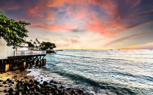 Numerous boats moored off shore in the water at sunset and a house on the waterfront in Lahaina; Lahaina, Maui, Hawaii, United States of America Poster Print by LJM Photo (19 x 12)