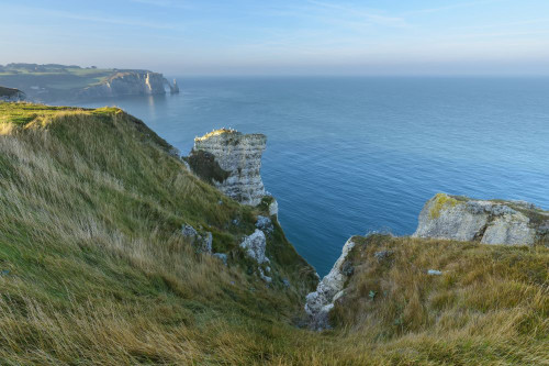 Coastline with cliffs in the morning, Etretat, Seine-Maritime Department, Atlantic Ocean, Normandy, France Poster Print by Raimund Linke (19 x 12)