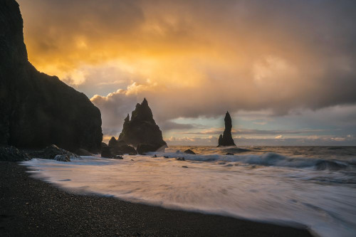 The Sea Stacks Known As Reynisdrangar With Waves At Sunrise, South Coast; Iceland Poster Print by Robert Postma (19 x 12)