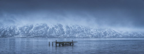 The old dock in Djupavik, Iceland in moody weather with clouds hanging low over the mountains; Djupavik, West Fjords, Iceland Poster Print by Robert Postma (35 x 13)