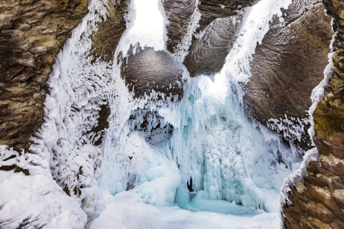 Frozen waterfall and pool at Johnston Canyon during winter in Banff National Park; Alberta, Canada Poster Print by LJM Photo (19 x 12)