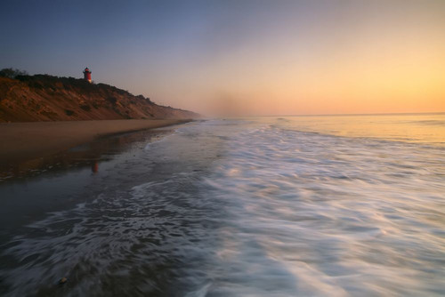 Nauset Beach Light and Nauset Beach at sunset at Cape Cod National Seashore, Massachusetts, USA; Cape Cod, Massachusetts, United States of America Poster Print by Michael Melford (17 x 11)