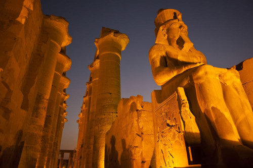Luxor Temple with ancient columns and sculptures in Luxor, Egypt.; Luxor, Egypt Poster Print by Michael Melford (17 x 11)