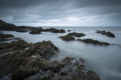 The rocky North Devon coastline at Westward Ho! Poster Print by Loop Images Ltd. (20 x 13)