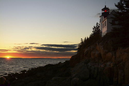 Sunset view of the Bass Harbor Lighthouse and the rocky shoreline in Acadia National Park.; Bass Harbor Head Lighthouse, Acadia National Park, Mount Desert Island, Maine. Poster Print by Darlyne Murawski (20 x 13)