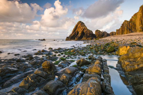 Blackchurch Rock at Mouth Mill on the North Devon Heritage Coast. Poster Print by Loop Images Ltd. (20 x 13)