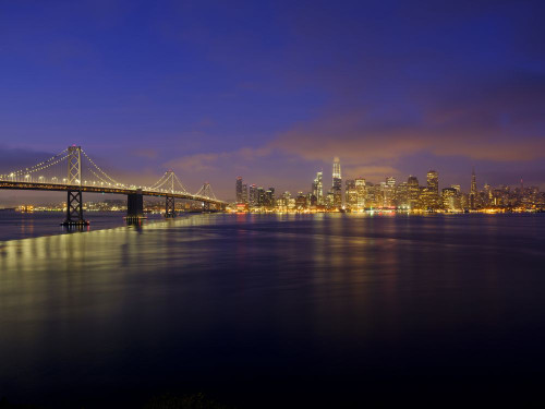 View of San Francisco and the Oakland Bay Bridge pre-sunrise. Poster Print by Loop Images Ltd. (18 x 14)