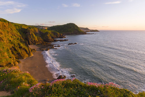 Hele Bay and Ilfracombe on the North Devon Heritage Coast viewed from Rillage Point. Poster Print by Loop Images Ltd. (20 x 13)