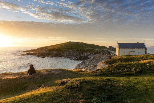 Golden light of an intense sunset over Towan Head on the coast of Newquay in Cornwall. Poster Print by Loop Images Ltd. (17 x 11)