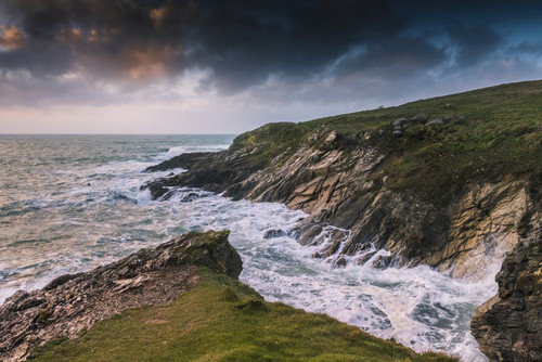 The wild rocky coastline around Towan Head in Newquay in Cornwall. Poster Print by Loop Images Ltd. (18 x 12)
