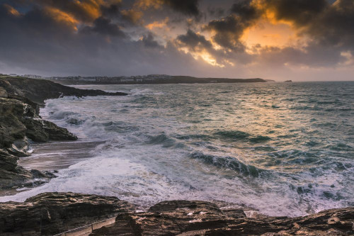 A dramatic Cornish sunset over Fistral Bay in Newquay. Poster Print by Loop Images Ltd. (20 x 13)