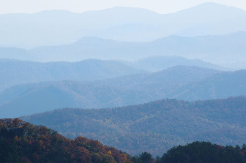 A bluish haze over the Blue Ridge Mountains at sunset.; Blue Ridge Parkway, North Carolina. Poster Print by Darlyne Murawski (17 x 11)