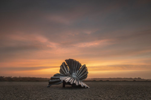 The art installation Clamshell at Aldeburgh in Suffolk at sunset. Poster Print by Loop Images Ltd. (20 x 13)