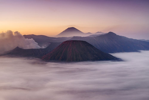 Dawn view of Mount Bromo and Gunung Semeru in Bromo Tengger Semeru National Park in Indonesia. Poster Print by Loop Images Ltd. (18 x 12)