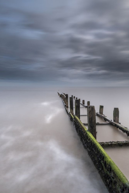 The sea defences at Overstrand on the North Norfolk coast at sunrise. Poster Print by Loop Images Ltd. (13 x 20)