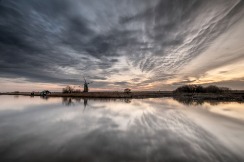 Sunset on the River Bure at St Benets Level drainage tower windmill. Poster Print by Loop Images Ltd. (20 x 13)