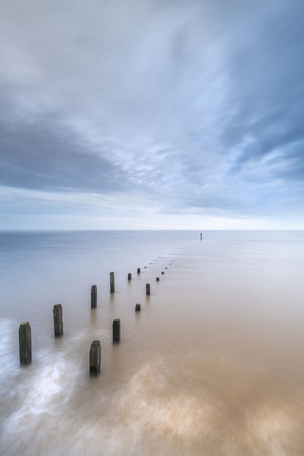 The sea defences at Overstrand on the North Norfolk coast at sunrise. Poster Print by Loop Images Ltd. (13 x 19)
