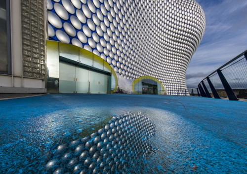 The Selfridges building reflected in a puddle. Poster Print by Loop Images Ltd. (19 x 13)