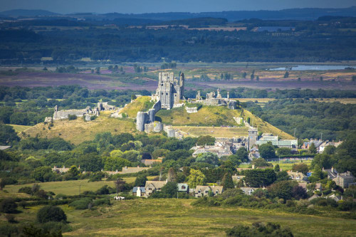 View to Corfe Castle. Poster Print by Loop Images Ltd. (19 x 12)