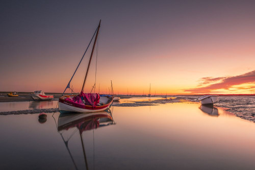 Dawn at Mow Creek in Brancaster Staithe on the north Norfolk coast. Poster Print by Loop Images Ltd. (20 x 13)