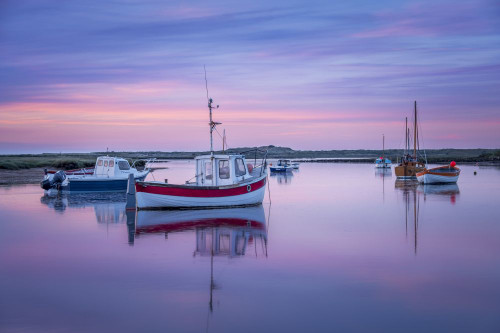 Boats in the creek at Burnham Overy Staithe. Poster Print by Loop Images Ltd. (19 x 13)