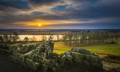 Sunrise over Cropston Reservoir seen from Charnwood Forest in Leicestershire. Poster Print by Loop Images Ltd. (19 x 11)