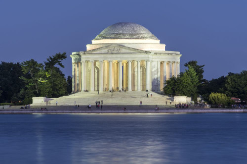 The Jefferson Memorial at night across the Tidal Pool on the National Mall in Washington DC. Poster Print by Loop Images Ltd. (19 x 13)