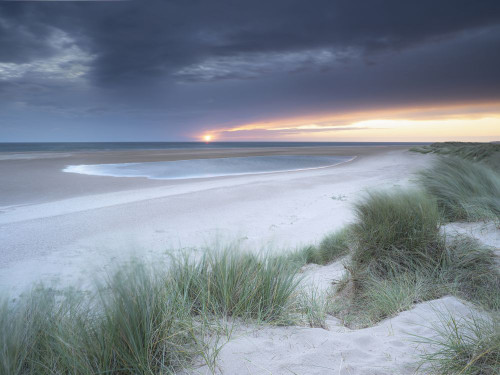 Sunrise over the Burnham Overy dunes on a summer morning. Poster Print by Loop Images Ltd. (18 x 14)