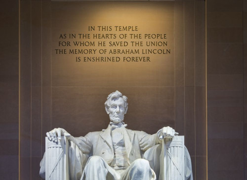 Statue of President Abraham Lincoln inside the Lincoln Memorial on the National Mall in Washington DC. Poster Print by Loop Images Ltd. (18 x 13)