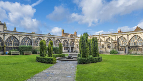 Gloucester Cathedral cloister garden. Poster Print by Loop Images Ltd. (20 x 11)