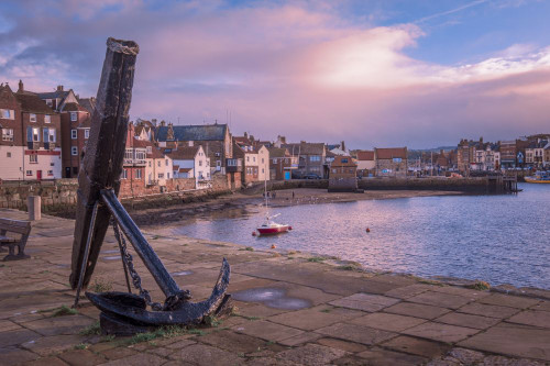 An ancient anchor on the harbour wall at Whitby. Poster Print by Loop Images Ltd. (20 x 13)