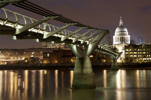 The Millennium Bridge spanning the River Thames between Bankside on the South Bank and St Paul's Cathedral on the North Bank. Poster Print by Loop Images Ltd. (18 x 12)