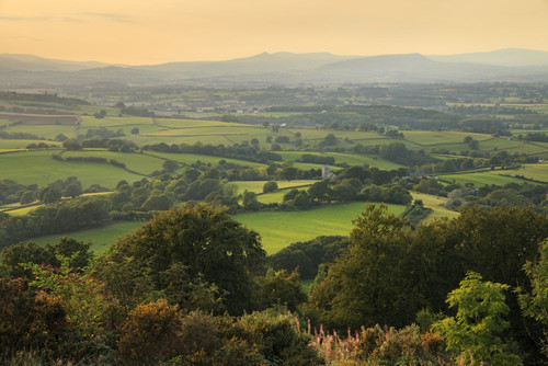 A view over Cwmcarvan towards the black mountains. Poster Print by Loop Images Ltd. (20 x 13)