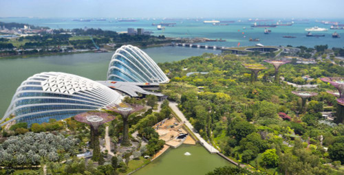 Overview by day of the Gardens by the Bay in Singapore. Poster Print by Loop Images Ltd. (23 x 12)