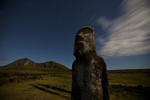 One of the Moai on Easter Island at Tongariki site, Chile; Easter Island, Isla de Pascua, Chile Poster Print by Michael Melford (17 x 11)