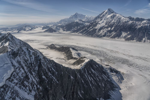 Aerial photo of Kluane National Park, with snow covered mountains and glacial masses making up the landscape; Haines Junction, Yukon, Canada Poster Print by Robert Postma (18 x 12)