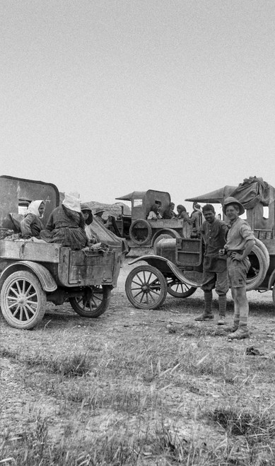 World War One photographs in Iraq (Mesopotamia). British Royal Engineers. Refugees being transported by British military vehicles with soldiers helping (probably Armenian refugees); Iraq Poster Print by John Short (12 x 21) World War One photographs in Iraq (Mesopotamia). British Royal Engineers. Refugees being transported by British military vehicles with soldiers helping (probably Armenian refugees); Iraq Poster Print by John Short (12 x 21)