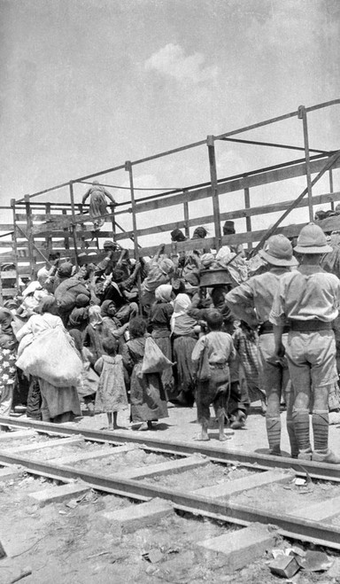 World War One photographs in Iraq (Mesopotamia). British Royal Engineers. The Bombay, Baroda and Central India Railway loading Armenian refugees. British troops helping them on board; Iraq Poster Print by John Short (12 x 21) World War One photographs in Iraq (Mesopotamia). British Royal Engineers. The Bombay, Baroda and Central India Railway loading Armenian refugees. British troops helping them on board; Iraq Poster Print by John Short (12 x 21)