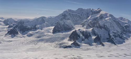 Aerial photo of Kluane National Park, with snow covered mountains making up the landscape. Mount Vancouver is seen here; Haines Junction, Yukon, Canada Poster Print by Robert Postma (23 x 10)